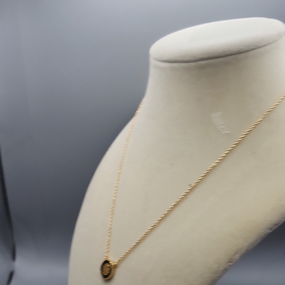 Tory Burch Black and Gold Emblem Necklace - Picture 9 of 9